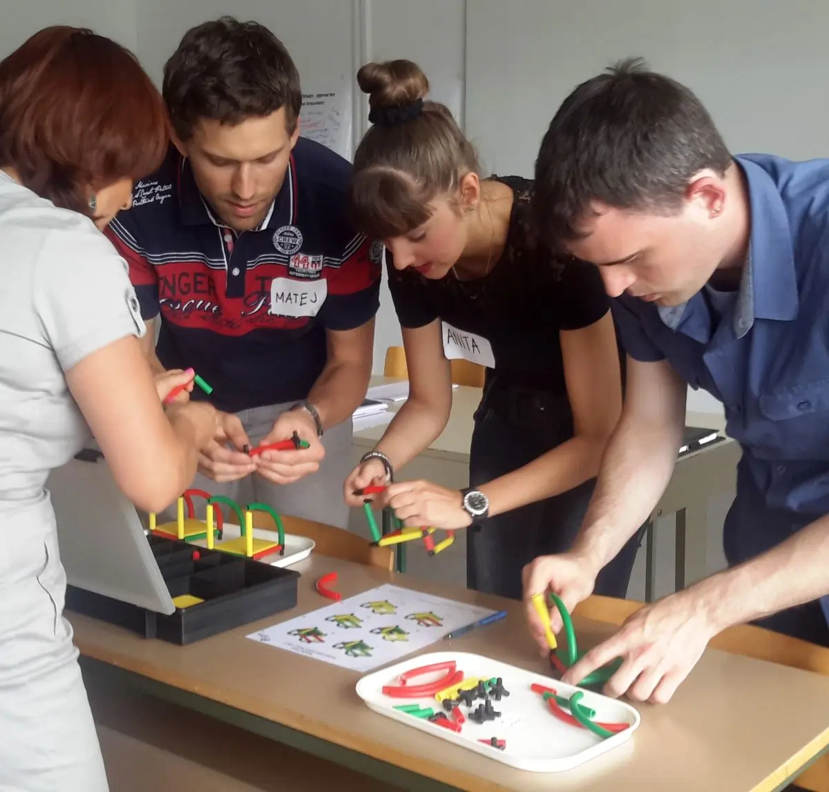 Participants at a Masterclass engaging in an activity with MTa KanDo Lean, bringing lean theory to life.