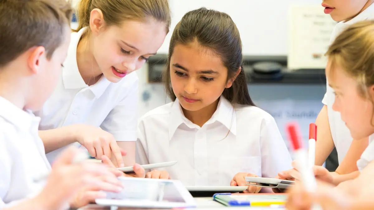 Children interacting with a tablet device