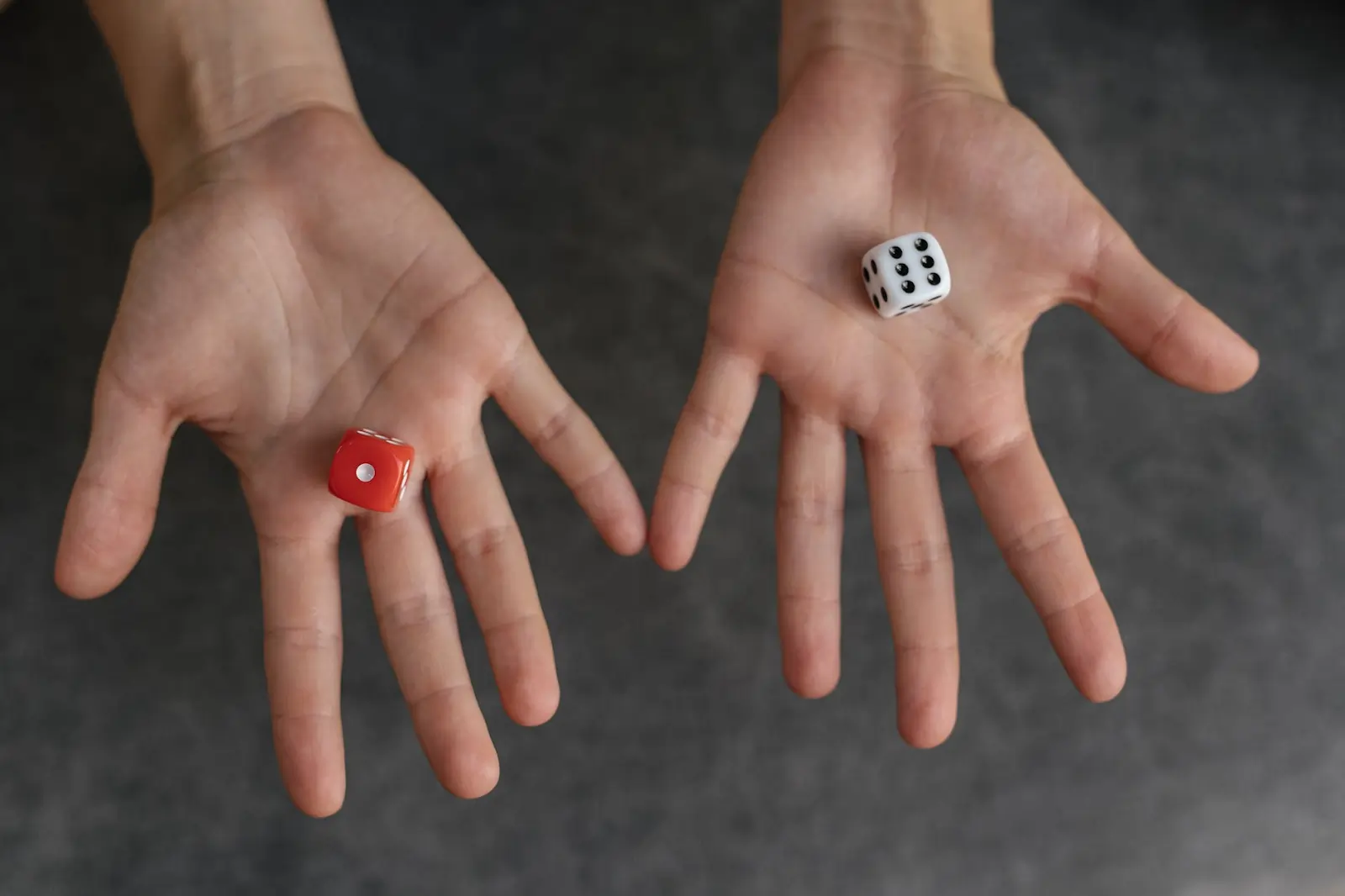 Dice on a surface, used in a STEM activity to explore probability and calculate the likelihood of different roll totals.