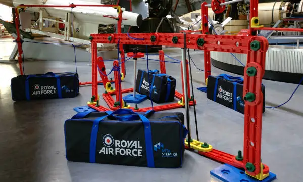 Royal Airforce cadets using MTa STEM kits to build structures, enhancing teamwork and problem-solving skills.