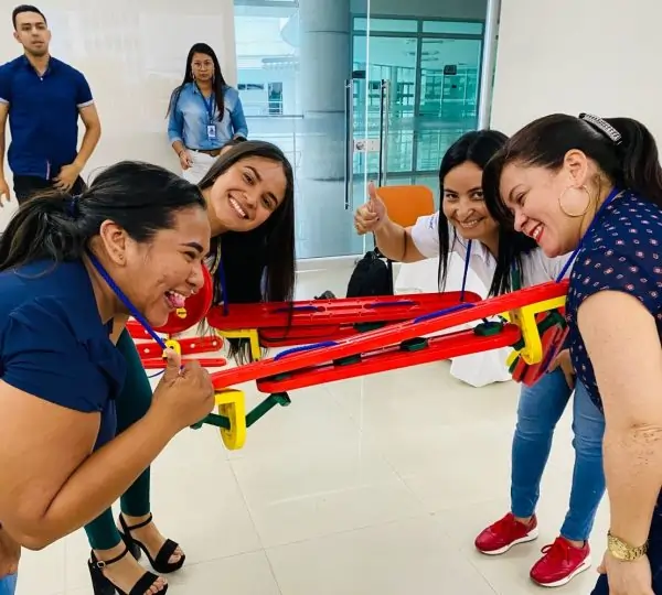 Participants collaborate in an MTa Insights activity, enhancing leadership skills through hands-on tasks.