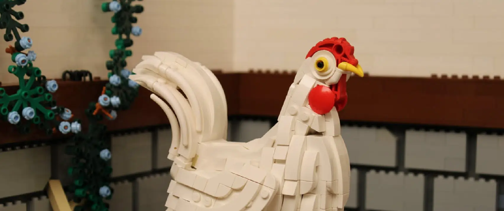 Lego chicken model representing creativity and teamwork in the Lego Challenge activity.