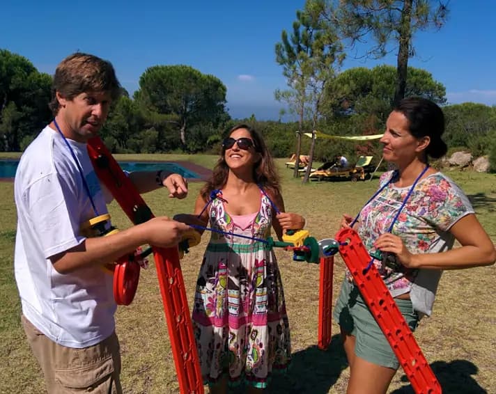 Participants engage in the MTa Insights necklace activity, promoting team-building and leadership.